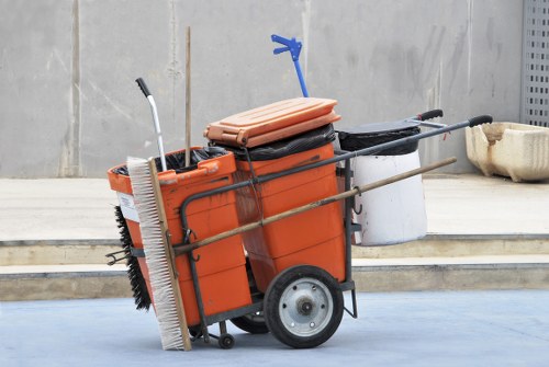 Front view of commercial waste collection vehicle at a business site in Upminster